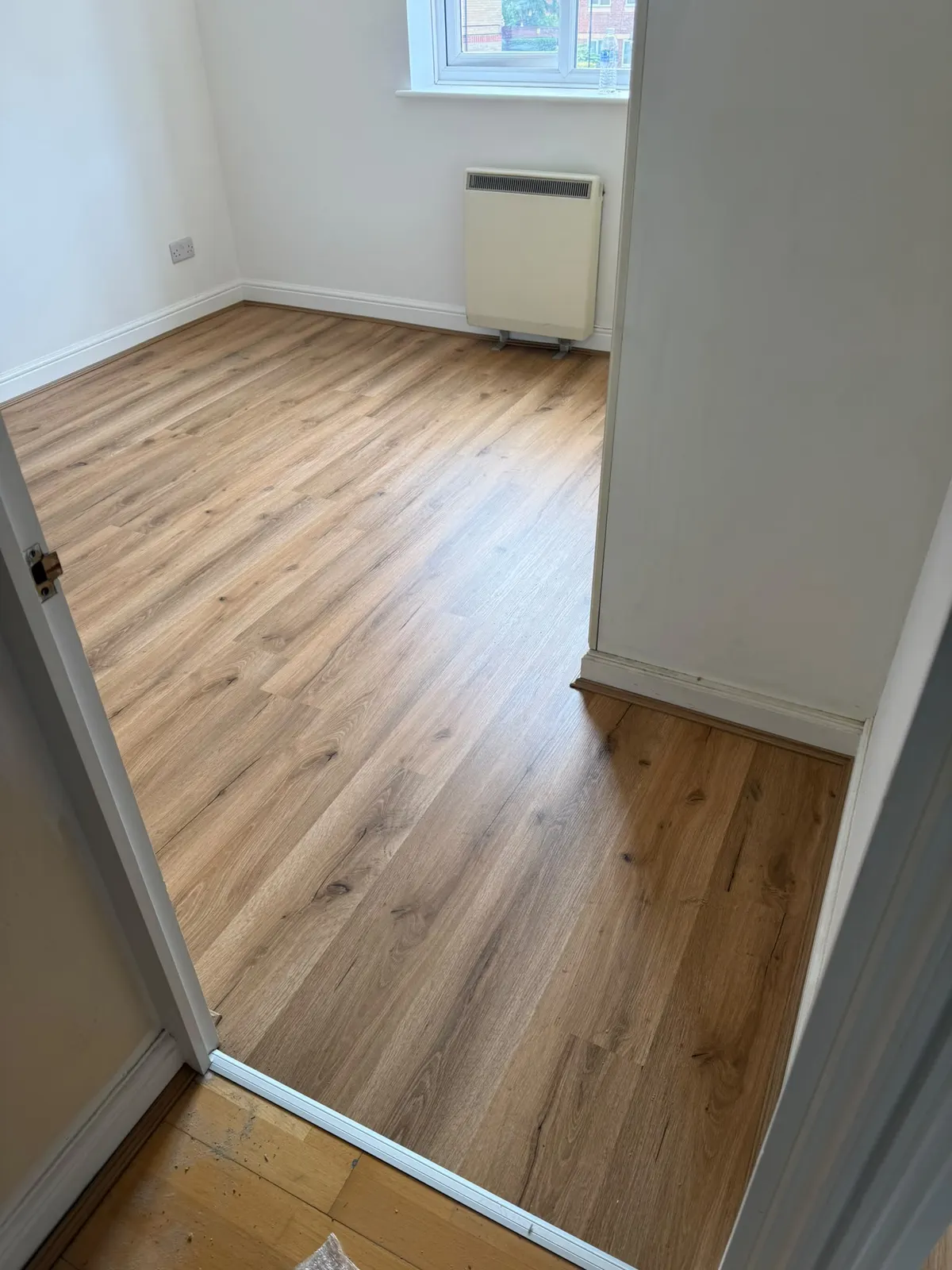 Oak laminate fitted in a bedroom