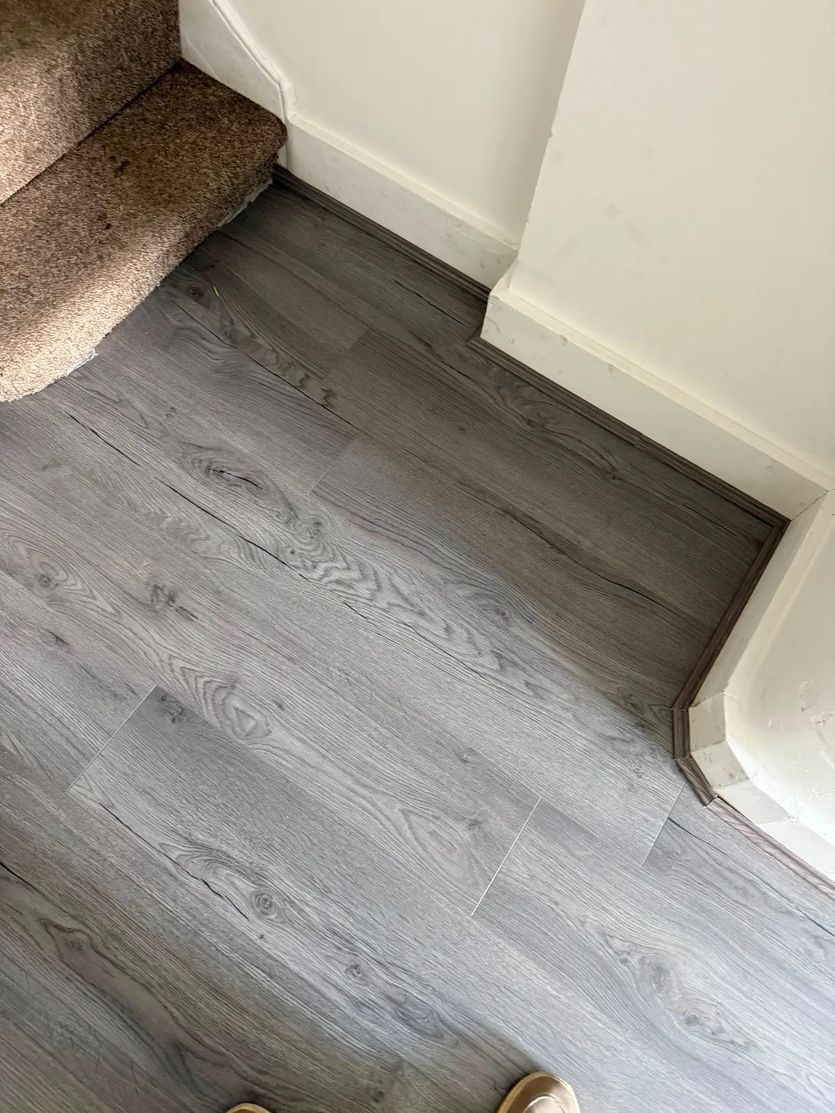 Grey laminate with matching scotia trim