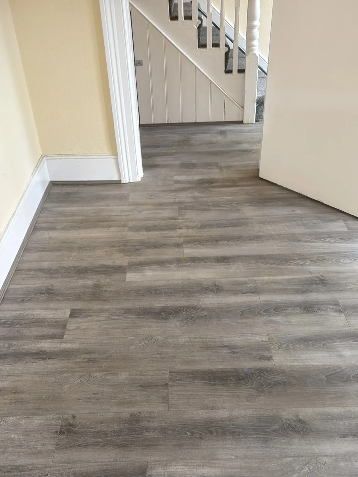 Grey laminate fitted in a hallway