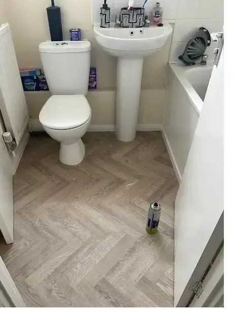 Herringbone vinyl flooring fitted in a bathroom