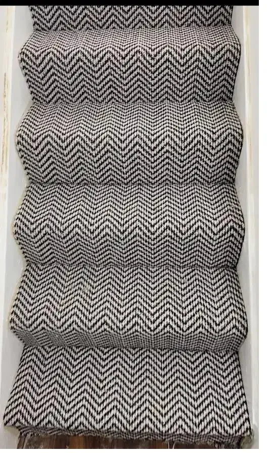 Black and white chevron stair runner fitted by Shazam Carpets & Floors