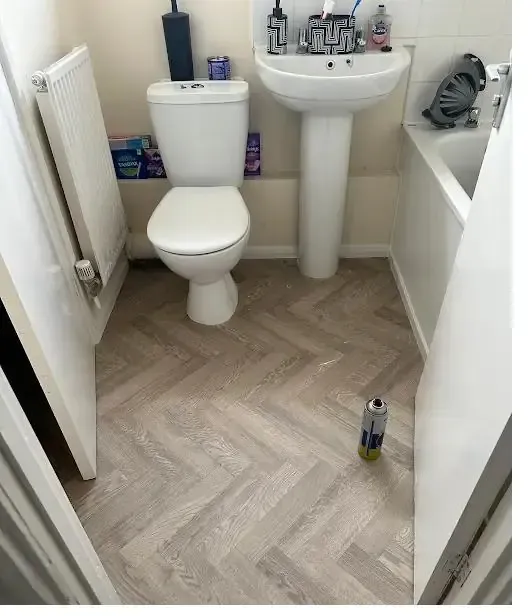 Herringbone vinyl flooring fitted in a bathroom
