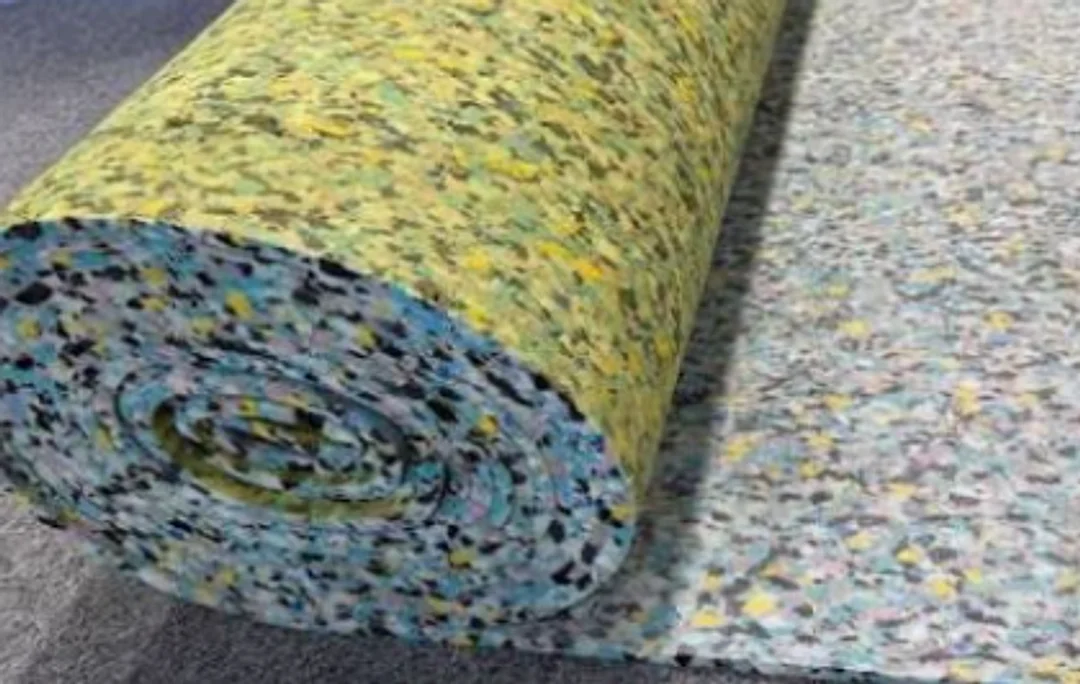 Rolls of neutral carpet stacked side by side